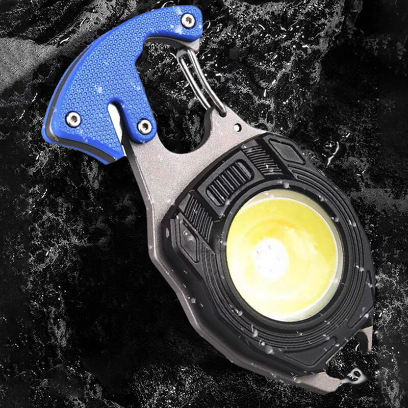 Fickmultiverktyg med ficklampa, nyckelring och visselpipa