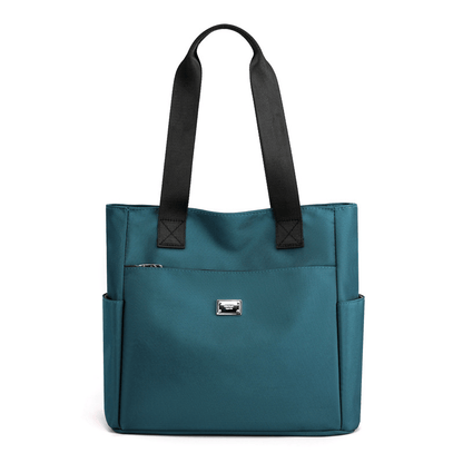 🔥Vattenavvisande axelväska i nylon med flera fickor och stor kapacitet👜