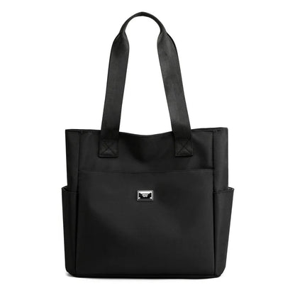 🔥Vattenavvisande axelväska i nylon med flera fickor och stor kapacitet👜