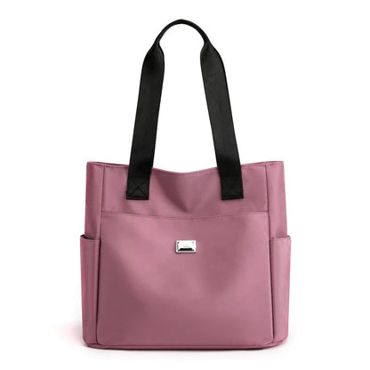🔥Vattenavvisande axelväska i nylon med flera fickor och stor kapacitet👜