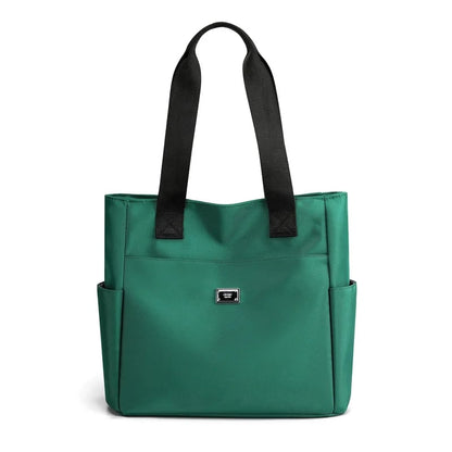 🔥Vattenavvisande axelväska i nylon med flera fickor och stor kapacitet👜